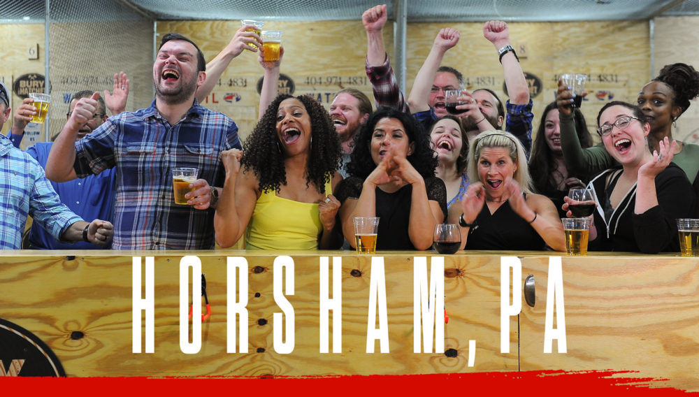 Bury The Hatchet Horsham PA City Page Header Image. Axe throwers celebrating with hands in air